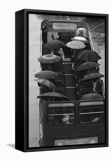 Tourists under Umbrellas on Open Top Bus, 1976-Kent Gavin-Framed Stretched Canvas