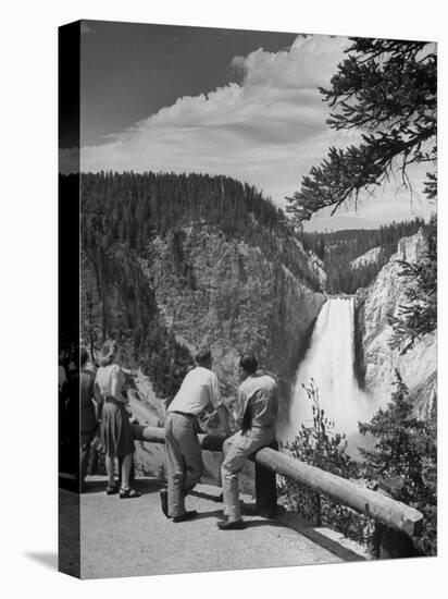 Tourists Viewing Waterfall in Yellowstone National Park-Alfred Eisenstaedt-Stretched Canvas