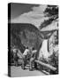 Tourists Viewing Waterfall in Yellowstone National Park-Alfred Eisenstaedt-Stretched Canvas