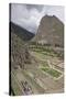 Tourists visit the ruins of the Inca archaeological site of Ollantaytambo near Cusco. Peru, South A-Julio Etchart-Stretched Canvas