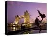 Tower Bridge and Girl with a Dolphin Fountain Statue at Dusk, London, England-Michele Falzone-Stretched Canvas