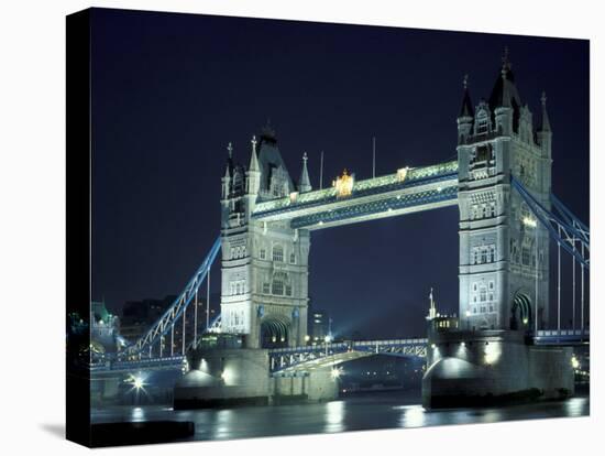 Tower Bridge at Night, London, England-Walter Bibikow-Stretched Canvas