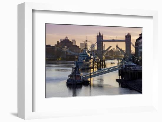 Tower Bridge raising deck with HMS Belfast on the River Thames, London, England, United Kingdom, Eu-Charles Bowman-Framed Photographic Print