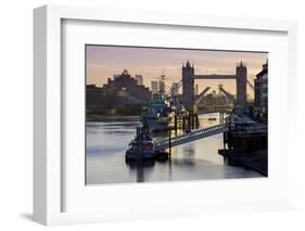 Tower Bridge raising deck with HMS Belfast on the River Thames, London, England, United Kingdom, Eu-Charles Bowman-Framed Photographic Print