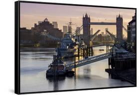 Tower Bridge raising deck with HMS Belfast on the River Thames, London, England, United Kingdom, Eu-Charles Bowman-Framed Stretched Canvas