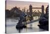 Tower Bridge raising deck with HMS Belfast on the River Thames, London, England, United Kingdom, Eu-Charles Bowman-Stretched Canvas
