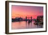 Tower Bridge, River Thames and HMS Belfast at sunrise with pink sky, and Canary Wharf-Ed Hasler-Framed Photographic Print