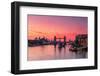 Tower Bridge, River Thames and HMS Belfast at sunrise with pink sky, and Canary Wharf-Ed Hasler-Framed Photographic Print