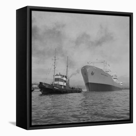 Towing the World Grandeur Ship-null-Framed Stretched Canvas