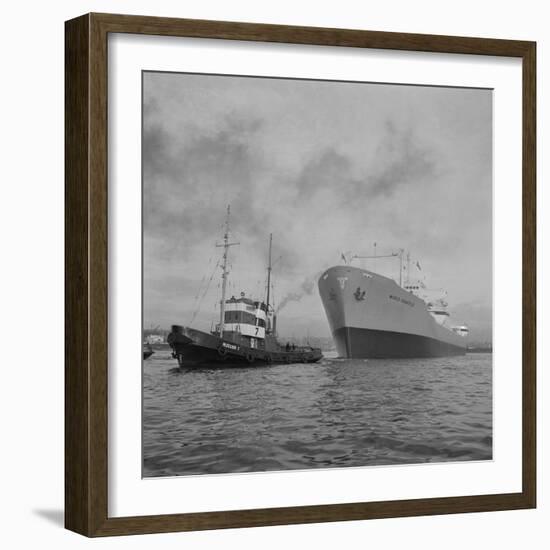 Towing the World Grandeur Ship-null-Framed Photographic Print