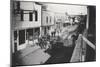 Town Center, Nome Alaska With Men In Suits-null-Mounted Art Print