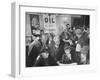 Town Residents Standing in Gas Station, Discussing Problems Caused by Oil Boom-Bernard Hoffman-Framed Photographic Print