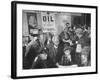 Town Residents Standing in Gas Station, Discussing Problems Caused by Oil Boom-Bernard Hoffman-Framed Photographic Print