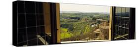 Town Viewed Through a Window, Siena, Siena Province, Tuscany, Italy-null-Stretched Canvas