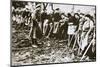 Townsfolk wait to scour the fields for potatoes left by farmers, Germany, World War I, c1914-c1918-Unknown-Mounted Photographic Print