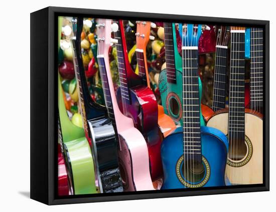 Toy Guitars, Olvera Street Market, El Pueblo de Los Angeles, Los Angeles, California, USA-Walter Bibikow-Framed Stretched Canvas