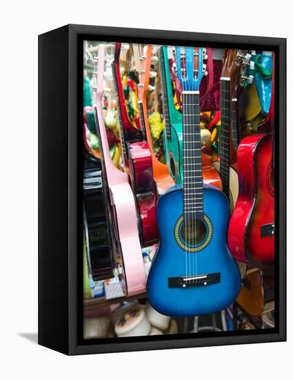 Toy Guitars, Olvera Street Market, El Pueblo de Los Angeles, Los Angeles, California, USA-Walter Bibikow-Framed Stretched Canvas