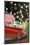 Toy Train Running Beneath Christmas Tree-Pauline St. Denis-Mounted Photographic Print