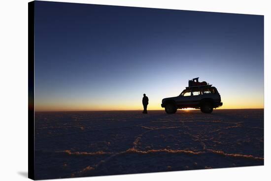 Toyota Land Cruiser Silhouetted Against Sunrise, Salar De Uyuni, Bolivia-James Brunker-Stretched Canvas