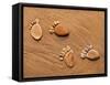 Trace Feet Steps Made Of A Pebble Stone On The Sea Sand Backdrop-Madlen-Framed Stretched Canvas