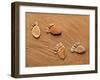 Trace Feet Steps Made Of A Pebble Stone On The Sea Sand Backdrop-Madlen-Framed Photographic Print