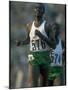 Track Athlete Kip Keino in Action at the Summer Olympics-John Dominis-Mounted Premium Photographic Print