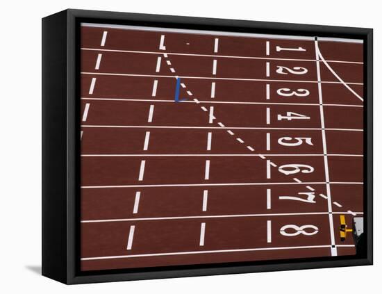 Track Lane Numbers at the Finish Line-Paul Sutton-Framed Stretched Canvas