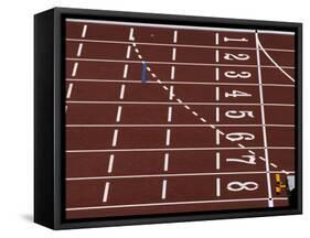 Track Lane Numbers at the Finish Line-Paul Sutton-Framed Stretched Canvas