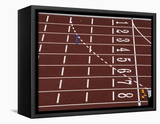 Track Lane Numbers at the Finish Line-Paul Sutton-Framed Stretched Canvas