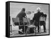 Track Officials Watching an Olympics' Race-Howard Sochurek-Framed Stretched Canvas
