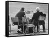 Track Officials Watching an Olympics' Race-Howard Sochurek-Framed Stretched Canvas