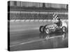 Track Record Holder Ted Tappett Circling Track With Checkered Flag After Winning-Ralph Morse-Stretched Canvas