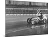 Track Record Holder Ted Tappett Circling Track With Checkered Flag After Winning-Ralph Morse-Mounted Premium Photographic Print