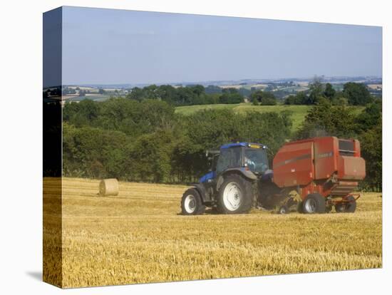 Tractor Collecting Hay Bales at Harvest Time, the Coltswolds, England-David Hughes-Stretched Canvas