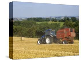 Tractor Collecting Hay Bales at Harvest Time, the Coltswolds, England-David Hughes-Stretched Canvas