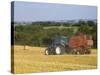 Tractor Collecting Hay Bales at Harvest Time, the Coltswolds, England-David Hughes-Stretched Canvas