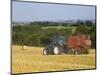 Tractor Collecting Hay Bales at Harvest Time, the Coltswolds, England-David Hughes-Mounted Photographic Print