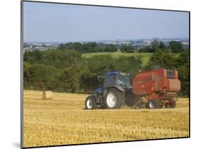 Tractor Collecting Hay Bales at Harvest Time, the Coltswolds, England-David Hughes-Mounted Photographic Print