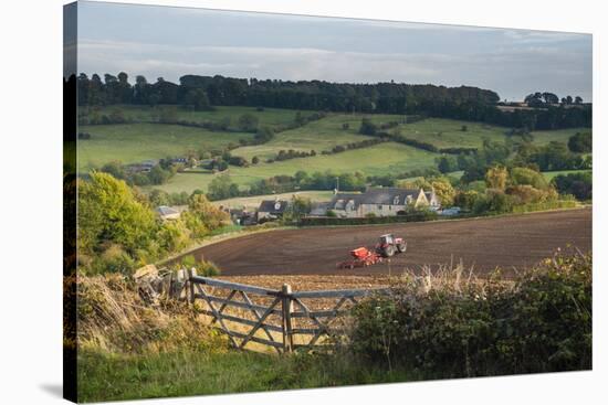 Tractor Ploughing Fields in Blockley, the Cotswolds, Gloucestershire, England-Matthew Williams-Ellis-Stretched Canvas