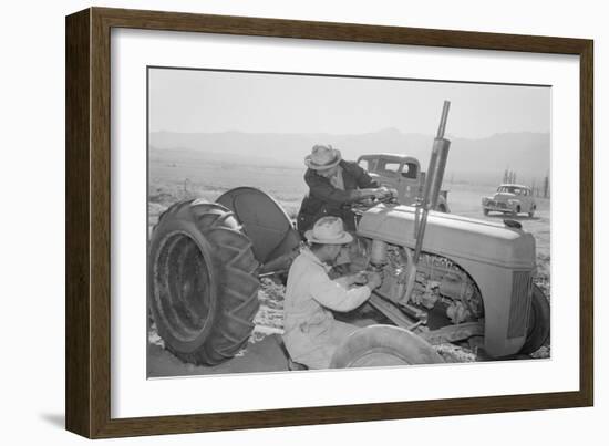 Tractor Repair: Driver Benji Iguchi, Mechanic Henry Hanawa, Manzanar Relocation Center, California-Ansel Adams-Framed Art Print