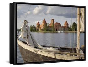 Traditional Boat and Trakai Castle, Trakai, Near Vilnius, Lithuania, Baltic States-Gary Cook-Framed Stretched Canvas