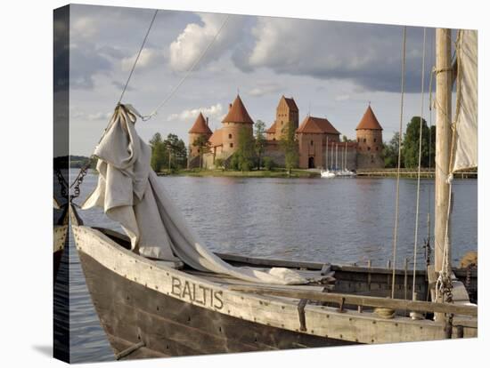 Traditional Boat and Trakai Castle, Trakai, Near Vilnius, Lithuania, Baltic States-Gary Cook-Stretched Canvas
