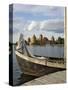 Traditional Boat and Trakai Castle, Trakai, Near Vilnius, Lithuania, Baltic States-Gary Cook-Stretched Canvas