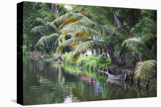 Traditional Boat Moored on the Still Water of the Kerala Backwaters, Kerala, India, Asia-Martin Child-Stretched Canvas