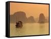 Traditional Boat Sailing Through Limestone Archipelago at Sunset, Ha Long Bay, UNESCO World Heritag-Stuart Black-Framed Stretched Canvas