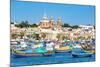 Traditional brightly painted fishing boats in the harbour at Marsaxlokk, Malta, Mediterranean, Euro-Martin Child-Mounted Photographic Print