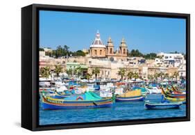 Traditional brightly painted fishing boats in the harbour at Marsaxlokk, Malta, Mediterranean, Euro-Martin Child-Framed Stretched Canvas