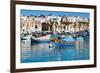 Traditional brightly painted fishing boats in the harbour at Marsaxlokk, Malta, Mediterranean, Euro-Martin Child-Framed Photographic Print