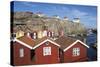 Traditional Falu Red Fishermen's Houses in Harbour, Sweden-Stuart Black-Stretched Canvas