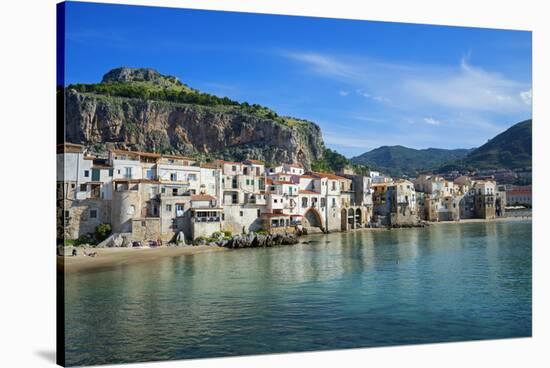 Traditional fishing boats and fishermens houses, Cefalu, Sicily, Italy, Europe-Marco Simoni-Stretched Canvas